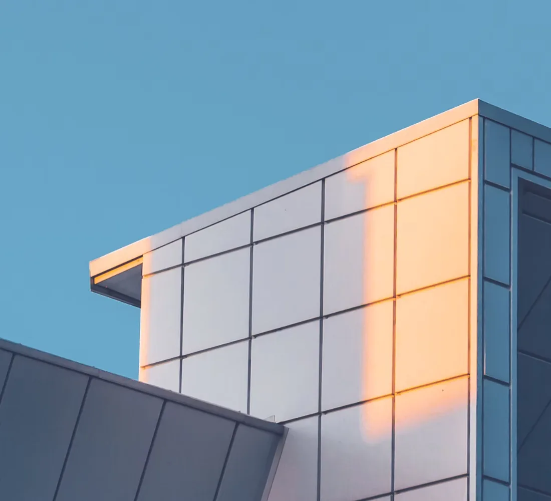 Cool blue architectural view representing professional real estate services